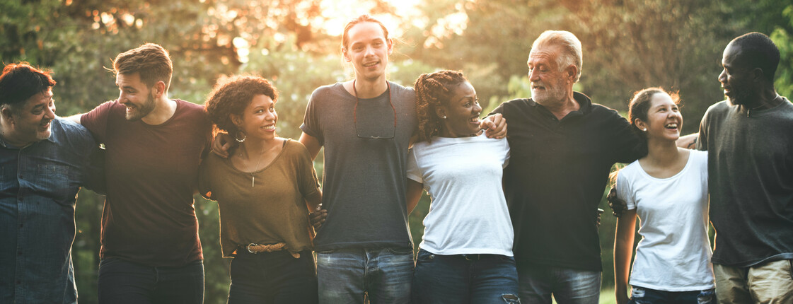 Cheerful,Diverse,People,Huddling,In,The,Park