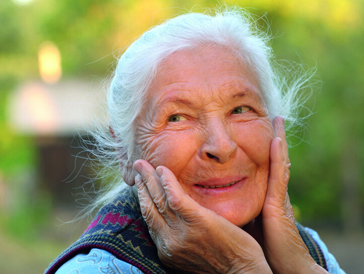 Portrait of the laughing elderly woman